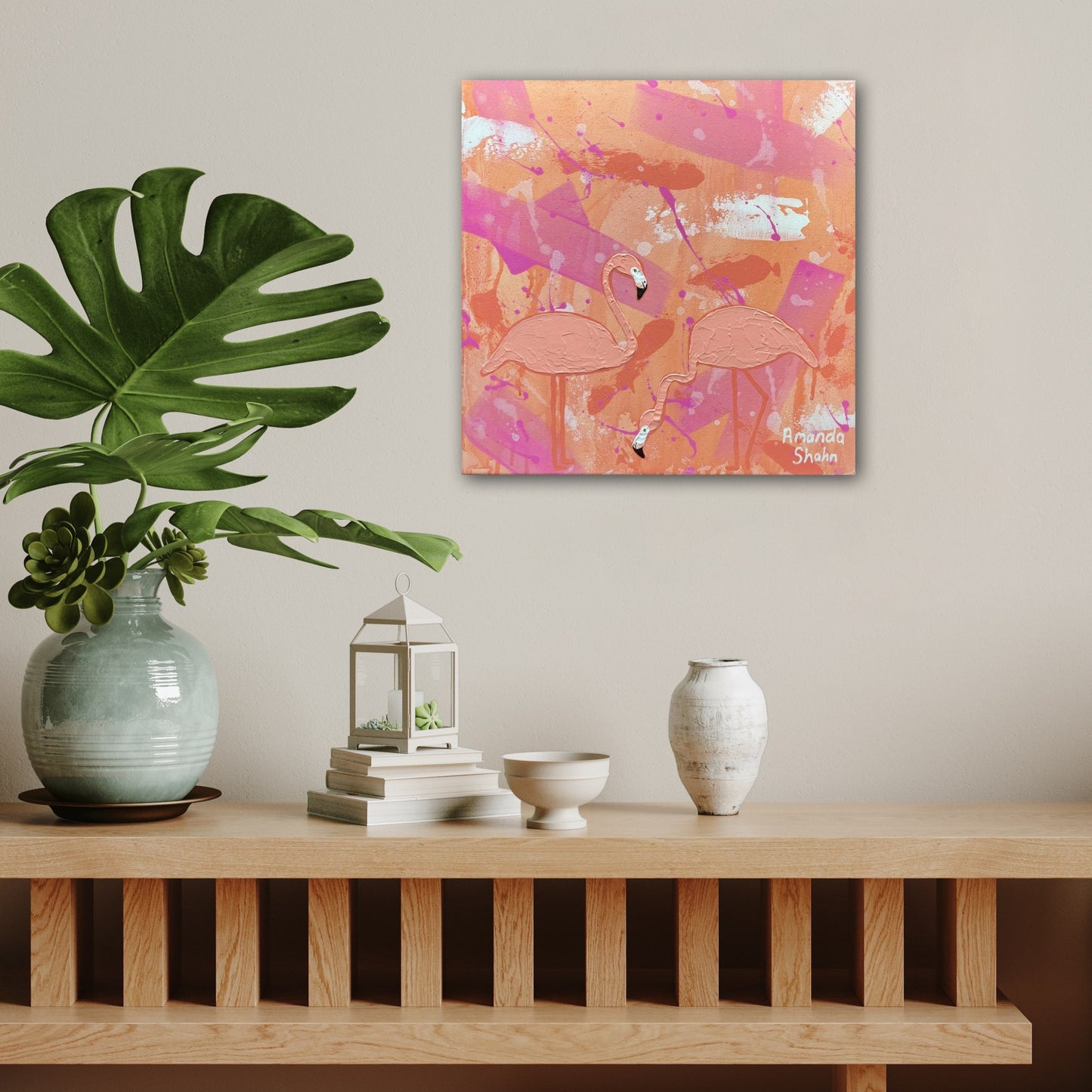 Be a flamingo original textured artwork displayed above a styled sideboard with a coastal theme