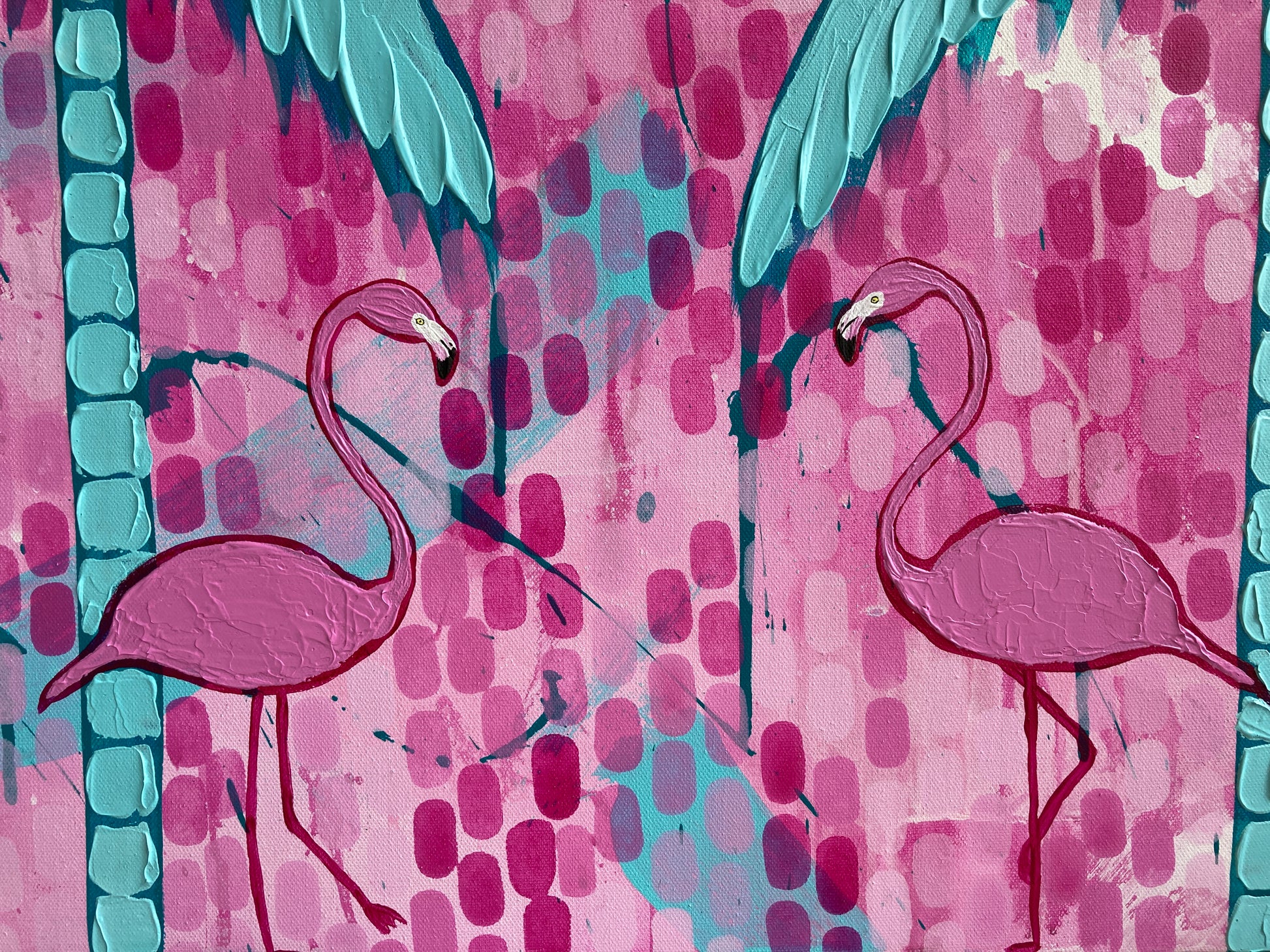 Up close detail of the two pink flamingos