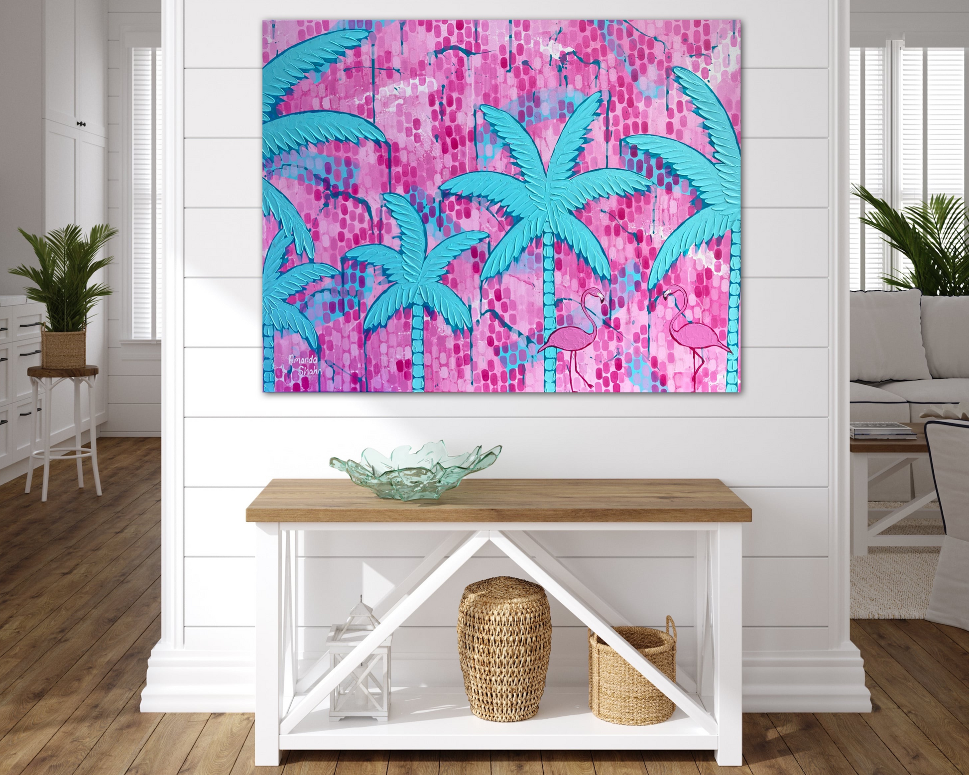 Textured palm tree and flamingo painting in situ above a hall table